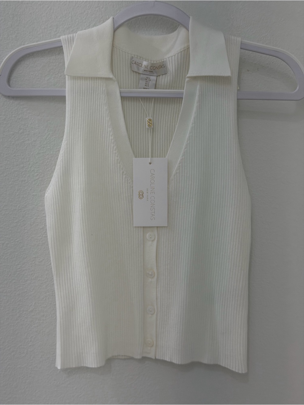 Caroline Constas Ivory Ribbed Button-Front Sleeveless Polo Tank